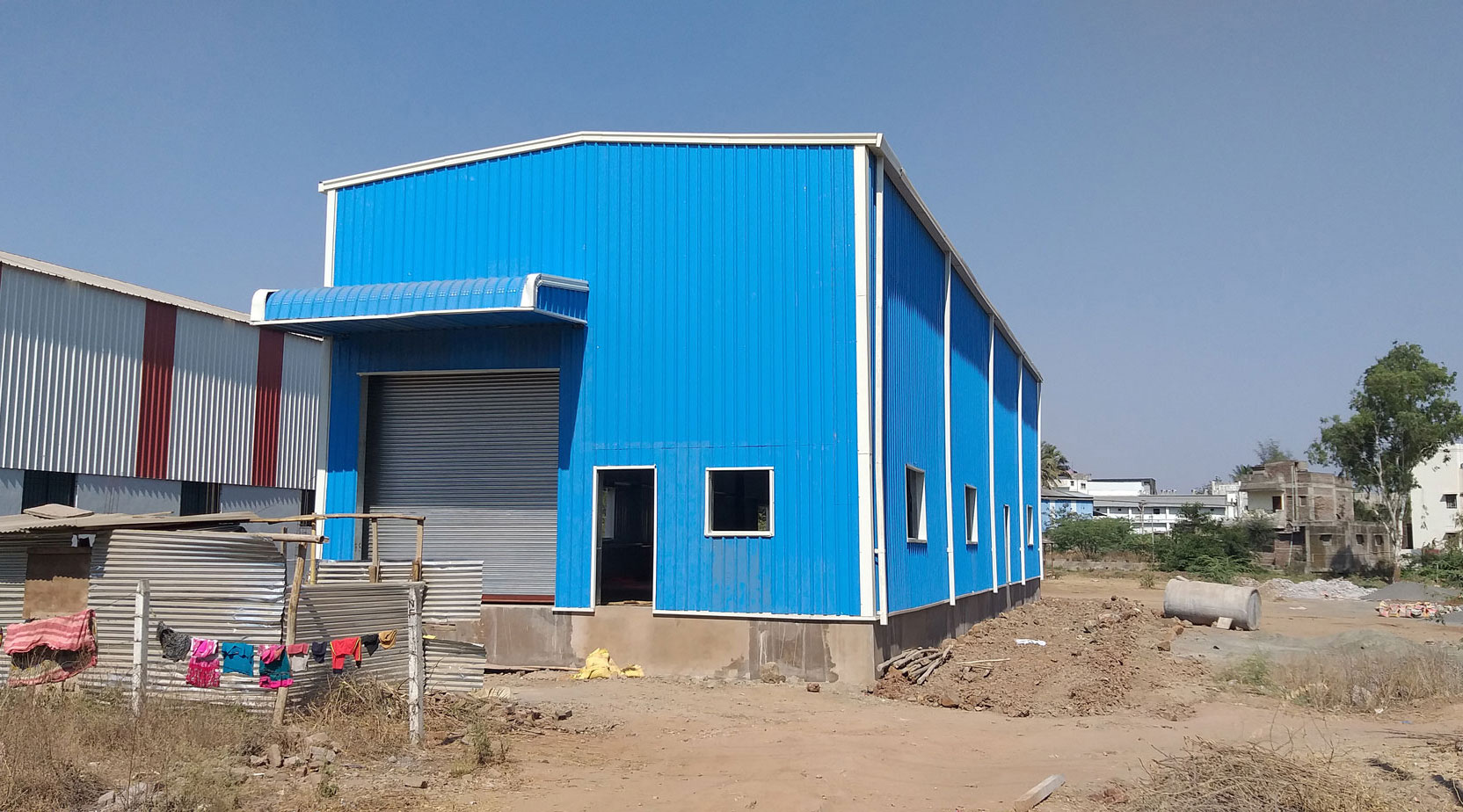 National Fluromers - Sangli | Proton - Metal Building & Roofing